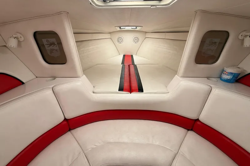 Slide: The Image of Interior of 1998 Donzi 33 ZX boat with red and white seating. - 35