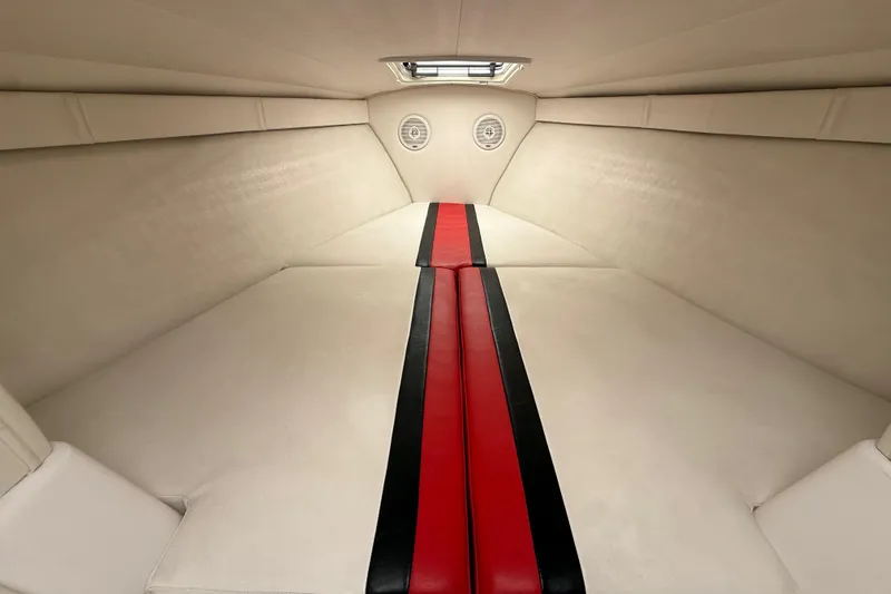 Slide: The Image of Interior cabin of 1998 Donzi 33 ZX boat with red and black accents. - 36
