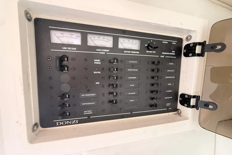 Slide: The Image of Electrical control panel on a 1998 Donzi 33 ZX boat. - 45