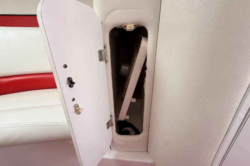 Slide: The Image of Open storage compartment on 1998 Donzi 33 ZX boat interior. - 47