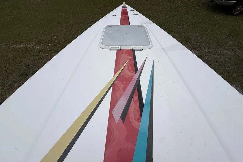 Slide: The Image of 1998 Donzi 33 ZX boat deck with colorful geometric design and hatch. - 55