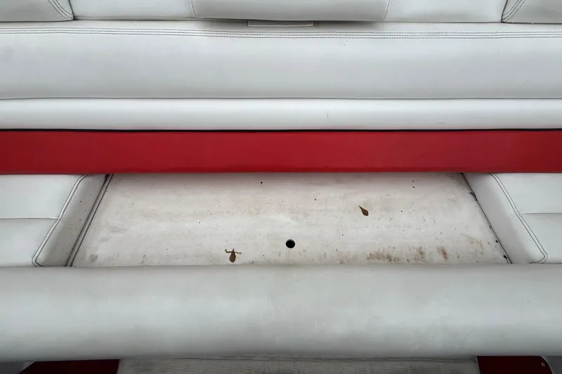 Slide: The Image of White and red seating area of a 1998 Donzi 33 ZX boat. - 64