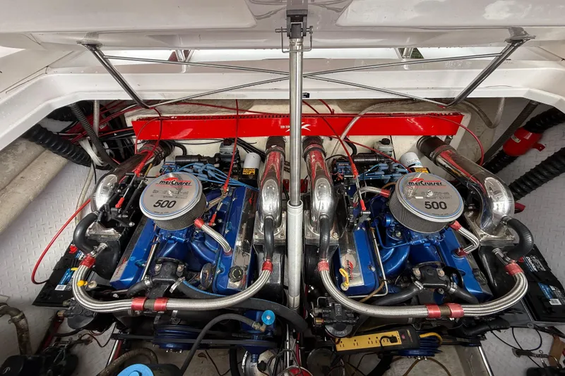 Slide: The Image of 1998 Donzi 33 ZX boat engine compartment with twin Mercury 500 engines. - 66