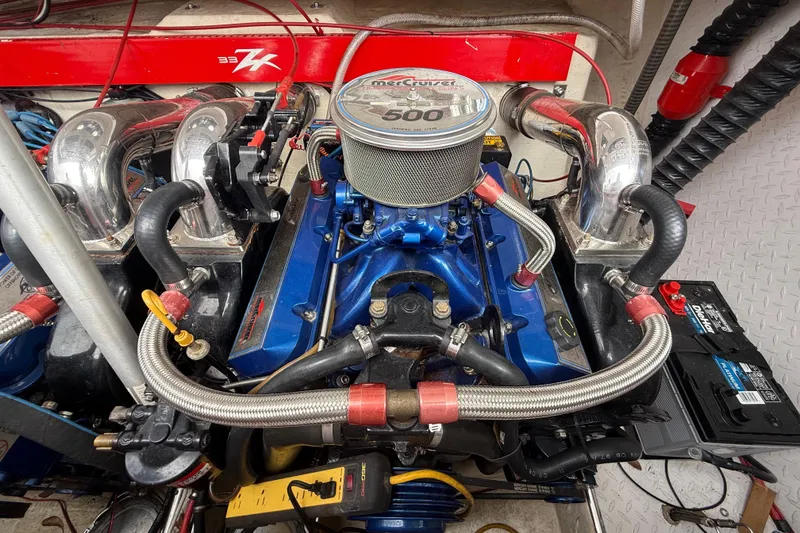 Slide: The Image of 1998 Donzi 33 ZX engine compartment with MerCruiser 500 EFI engine. - 69