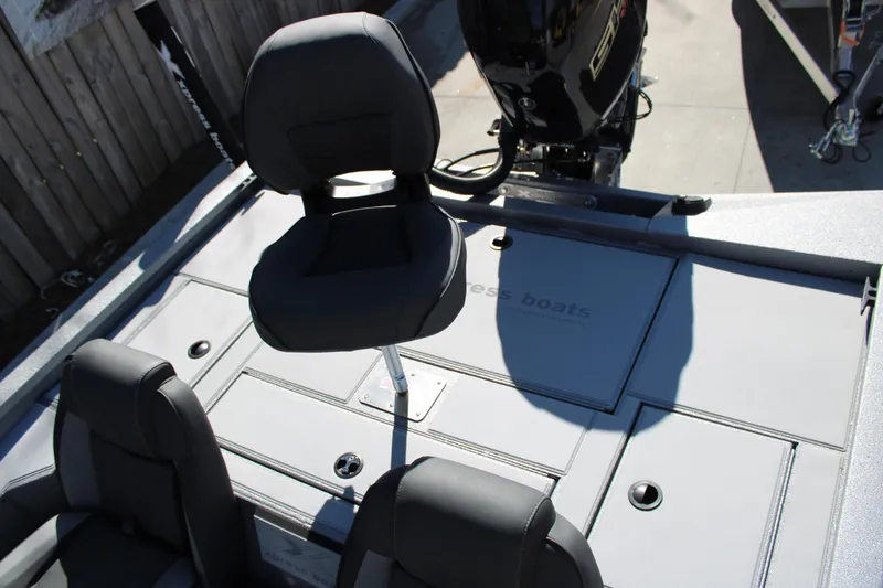 Slide: The Image of 2026 Xpress H20 boat interior with seating and motor, showcasing modern design. - 10