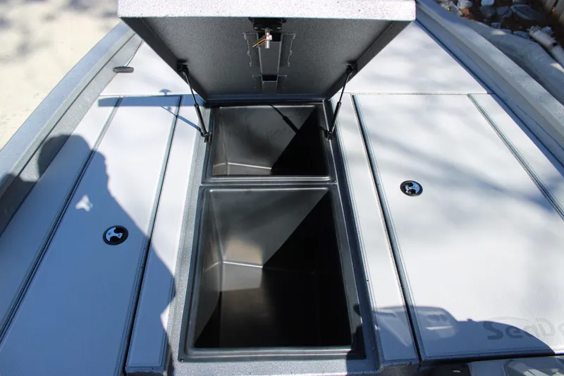 Slide: The Image of Open storage compartments on 2026 Xpress H20 boat deck. - 5
