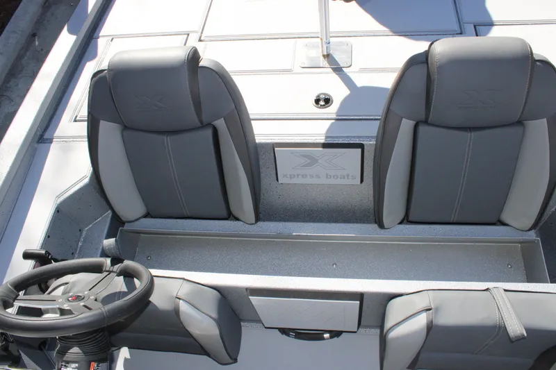 Slide: The Image of 2026 Xpress H20 boat interior with dual gray seats and steering wheel. - 9