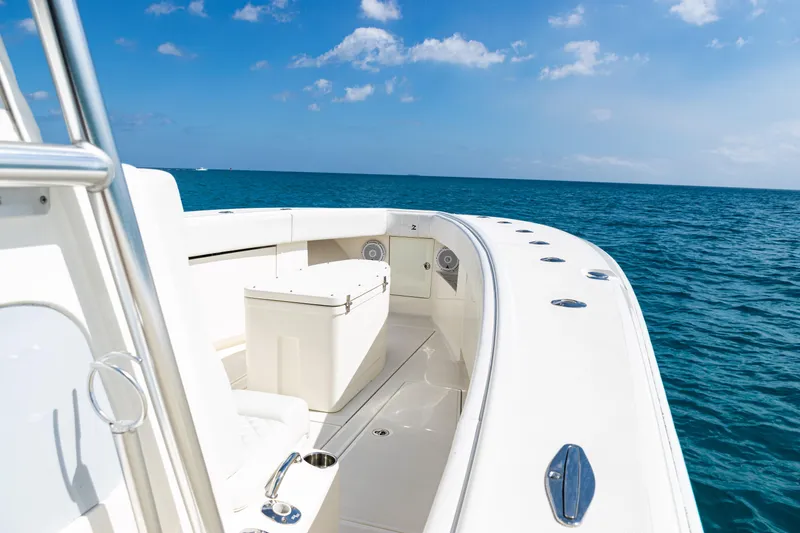 Slide: The Image of 2018 SeaVee 370Z boat on open ocean, clear sky, sunny day. - 19