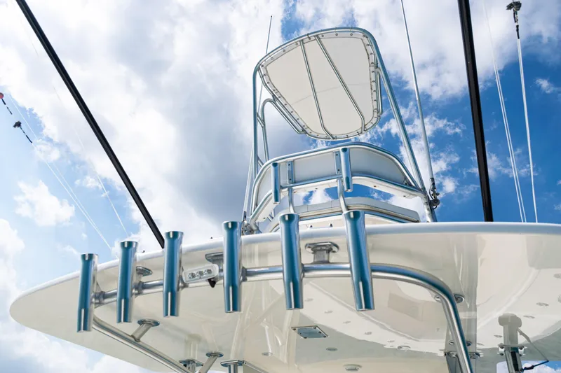 Slide: The Image of 2018 SeaVee 370Z boat tower against a cloudy blue sky. - 44