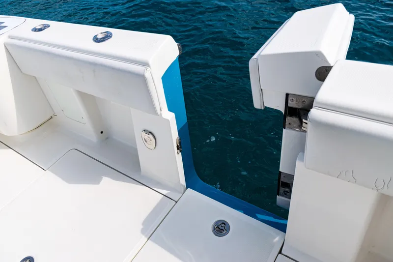 Slide: The Image of 2018 SeaVee 370Z boat with open transom door, showing ocean view. - 47