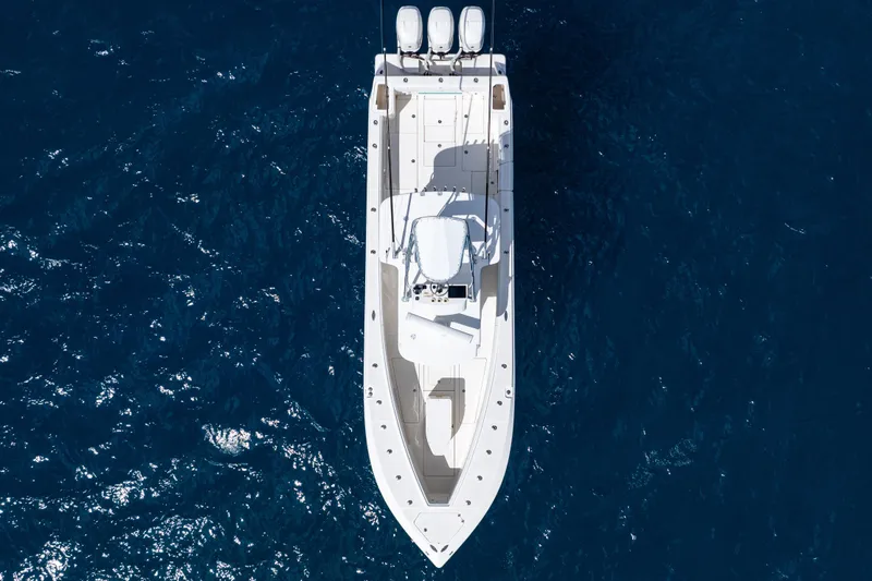 Slide: The Image of Overhead view of 2018 SeaVee 370Z boat on deep blue ocean water. - 64