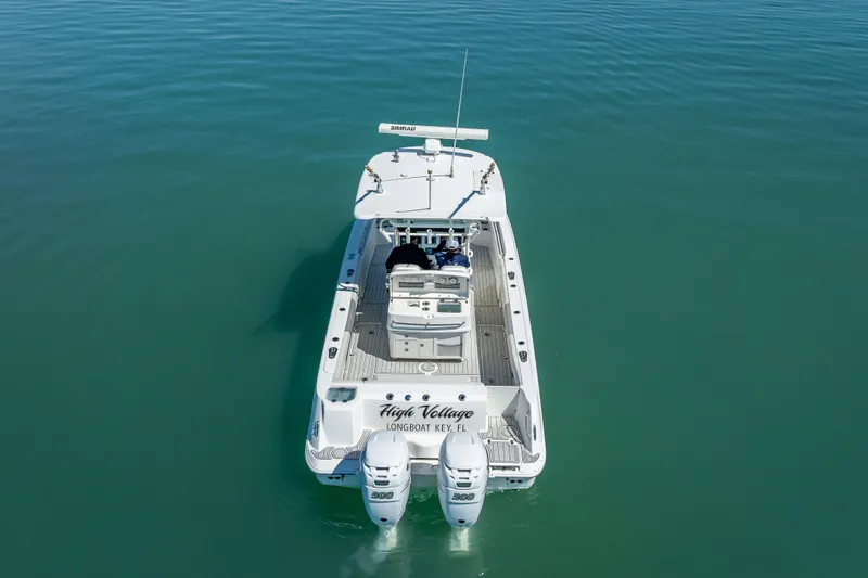 Slide: The Image of Aerial view of 2013 Boston Whaler 320 Outrage boat on calm water. - 11