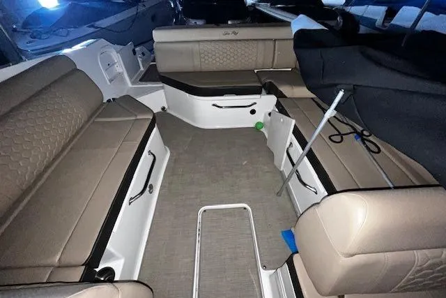 Slide: The Image of 2018 Sea Ray 270 Sundeck interior with spacious seating and modern design. - 13