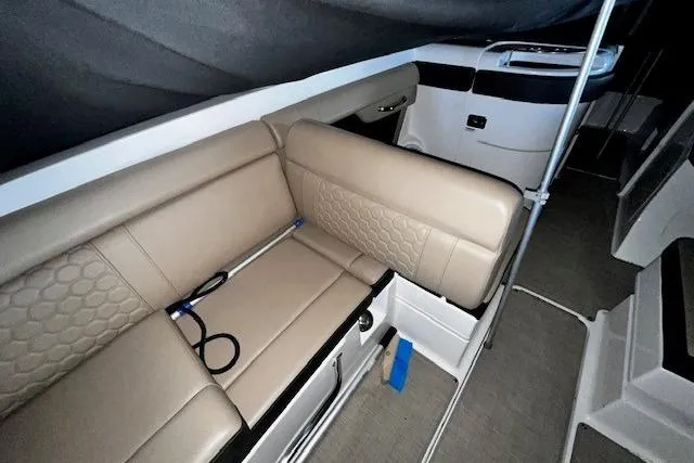 Slide: The Image of Interior of 2018 Sea Ray 270 Sundeck with beige seating and modern design. - 5