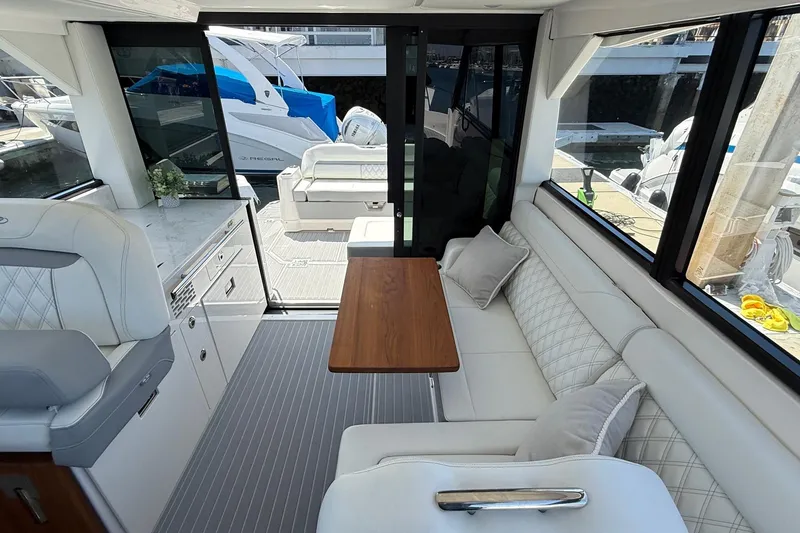 Slide: The Image of Luxurious interior of 2026 Regal 36 XO yacht with elegant seating and modern design. - 48