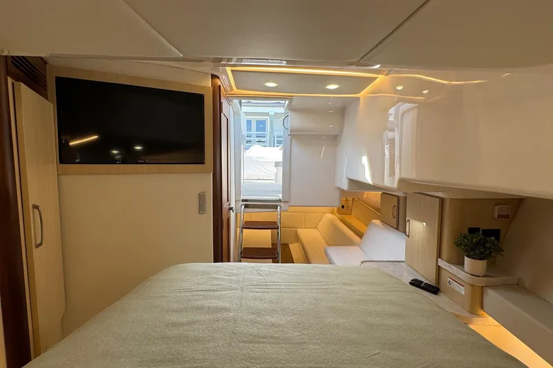Slide: The Image of Luxurious interior of 2026 Regal 36 XO yacht with modern amenities and elegant design. - 89