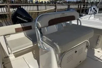 Slide: The Image of 2022 Cobia 237 Center Console boat with seating and Mercury engine. - 14
