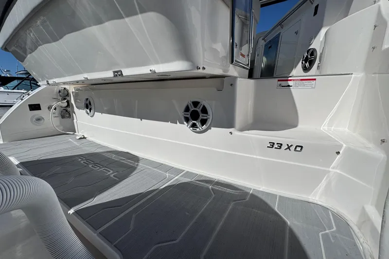 Slide: The Image of 2026 Regal 33 XO boat interior with sleek design and modern features. - 20