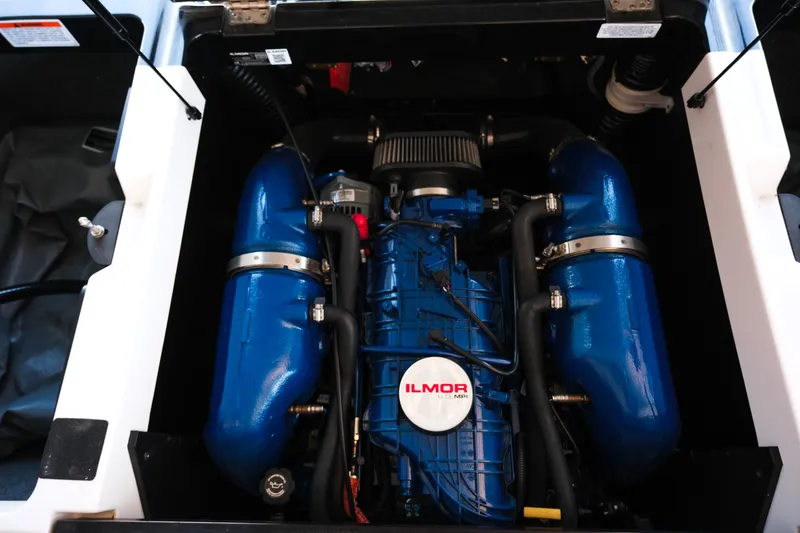 Slide: The Image of 2020 MasterCraft XT25 Ilmor engine, blue components, detailed view. - 12