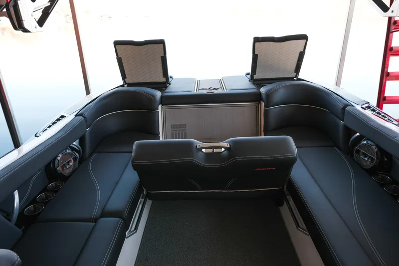 Slide: The Image of 2020 MasterCraft XT25 boat interior with luxurious seating and modern design. - 14
