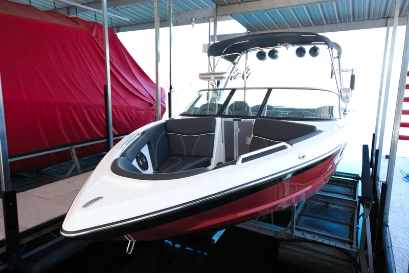 Slide: The Image of 2020 MasterCraft XT25 boat in dock, featuring sleek design and modern amenities. - 33