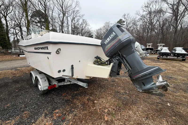 Slide: The Image of 2004 Grady-White Gulfstream 232 boat with Yamaha outboard motor on trailer. - 5