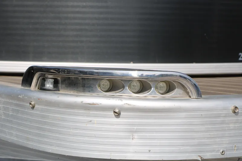 Slide: The Image of Close-up of 2015 Bennington 21 SLX boat's LED lights and aluminum detailing. - 8