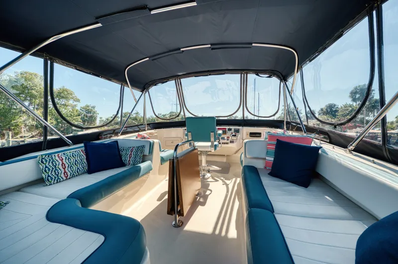 Slide: The Image of Interior of 2005 Mainship 400 Trawler with blue upholstery. - 36