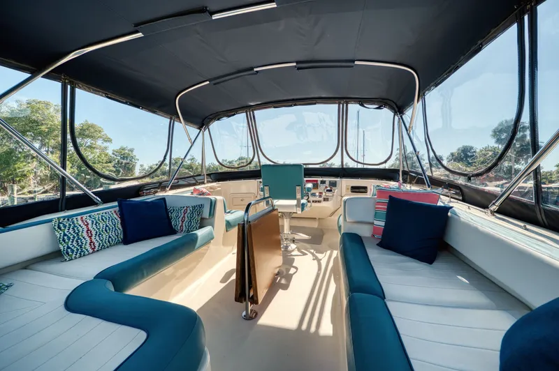 Slide: The Image of Interior of 2005 Mainship 400 Trawler with blue upholstery. - 37