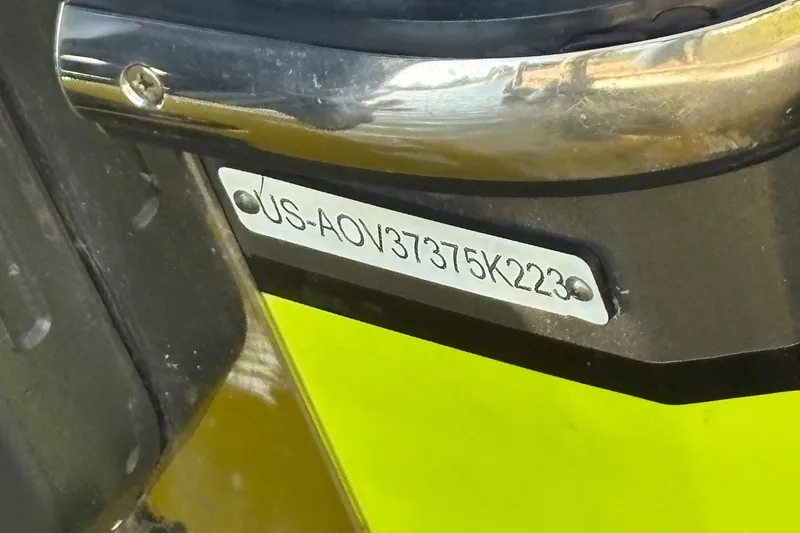 Slide: The Image of 2023 Nor-Tech 390 Sport Center Console with visible hull identification number. - 24