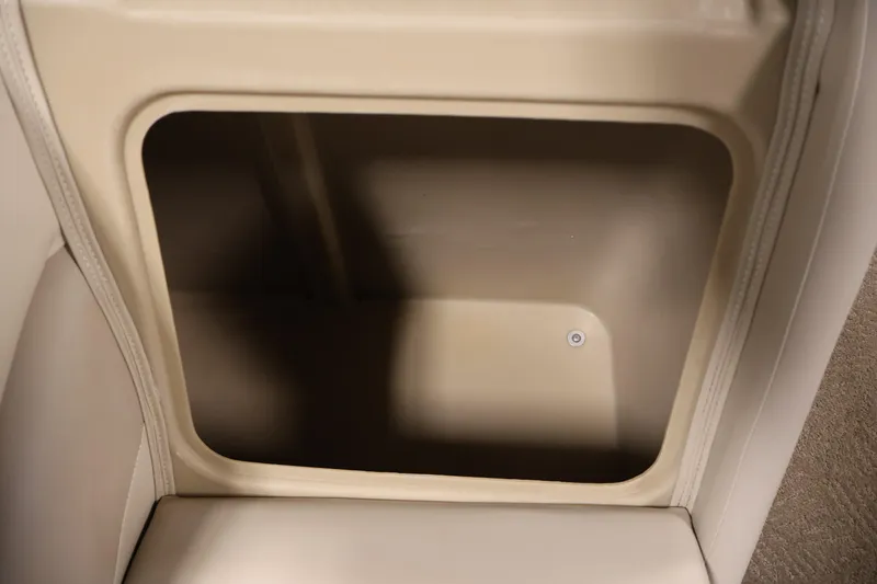 Slide: The Image of Storage compartment in 2012 Bennington 2275 GCW boat, beige interior. - 16