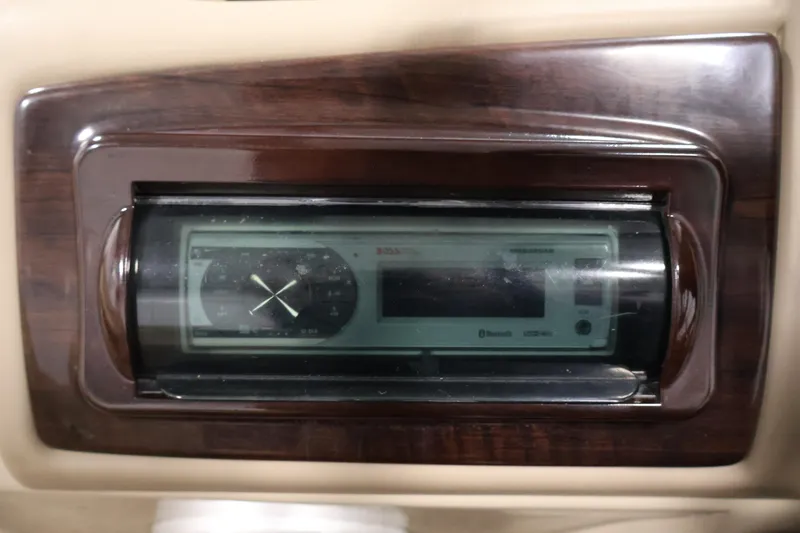 Slide: The Image of Dashboard of a 2012 Bennington 2275 GCW with integrated stereo system. - 29