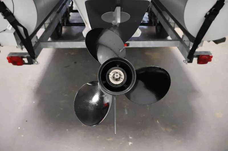 Slide: The Image of 2012 Bennington 2275 GCW boat propeller on trailer, close-up view. - 42