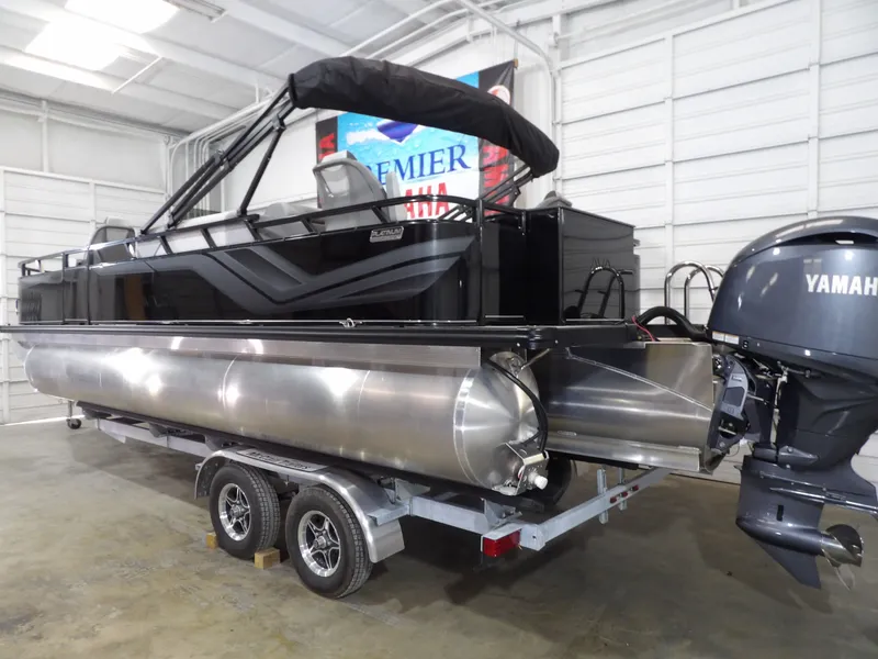 Slide: The Image of 2025 Avalon VNT85 CC 23T pontoon boat with Yamaha engine in warehouse. - 5