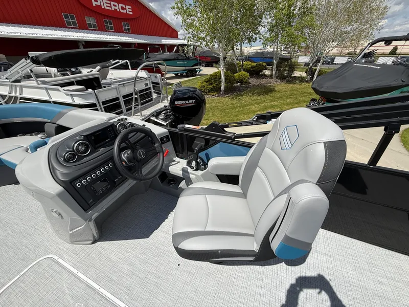 Slide: The Image of Interior of a 2026 South Bay S224FCR pontoon boat with helm console. - 12