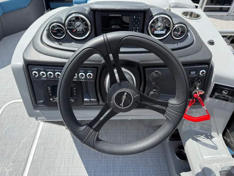 Slide: The Image of Steering wheel and dashboard of South Bay S224FCR 2026. - 13