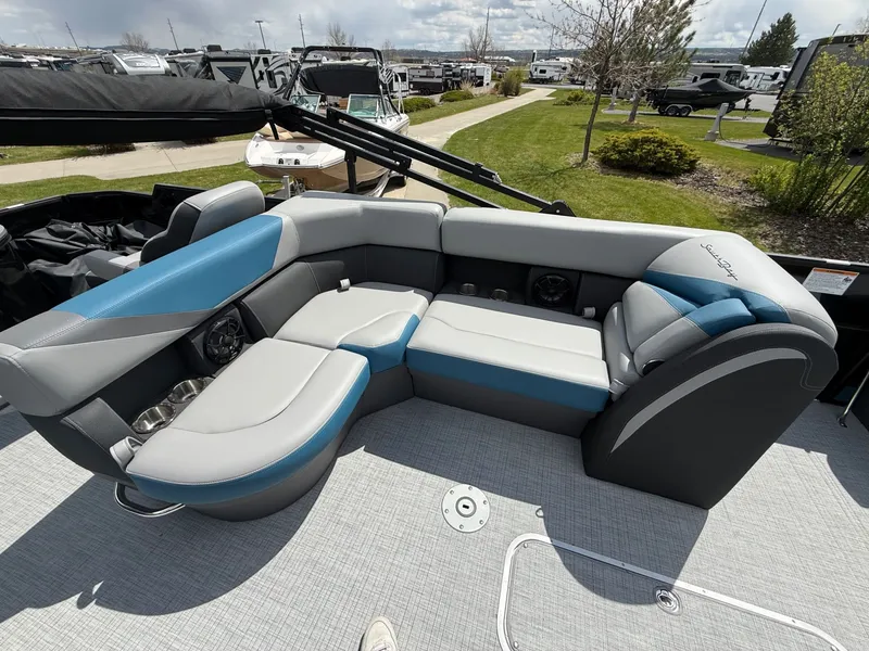 Slide: The Image of 2026 South Bay S224FCR pontoon boat with luxurious seating arrangement. - 14