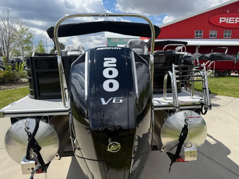 Slide: The Image of 2026 South Bay S224FCR with Mercury 200 V6 engine, displayed outdoors. - 5