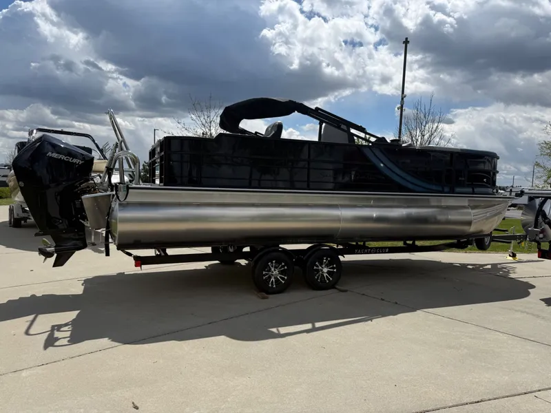 Slide: The Image of 2026 South Bay S224FCR pontoon boat on trailer under cloudy sky. - 7