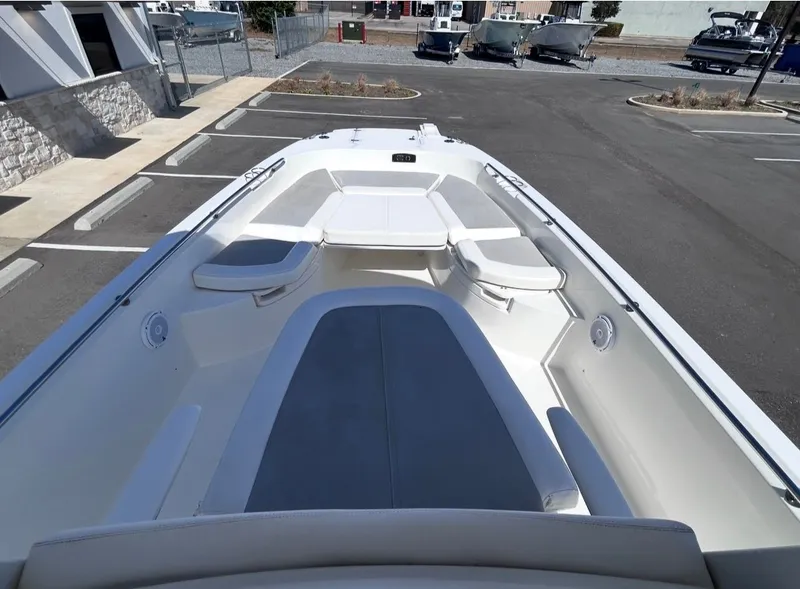 Slide: The Image of 2016 Boston Whaler 270 Dauntless with spacious deck and seating area. - 14
