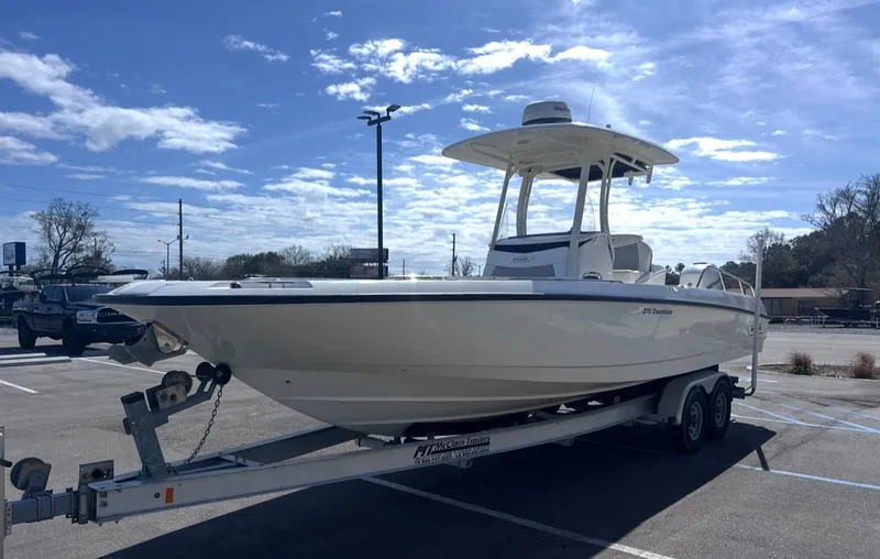 Slide: The Image of 2016 Boston Whaler 270 Dauntless parked on trailer outdoors. - 5
