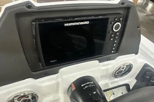 Slide: The Image of Dashboard of 2026 Xpress H18 boat featuring Humminbird Helix 7 fish finder. - 8