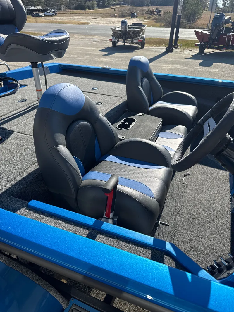 Slide: The Image of Interior of 2025 Vexus AVX1880 boat with blue and gray seats. - 15