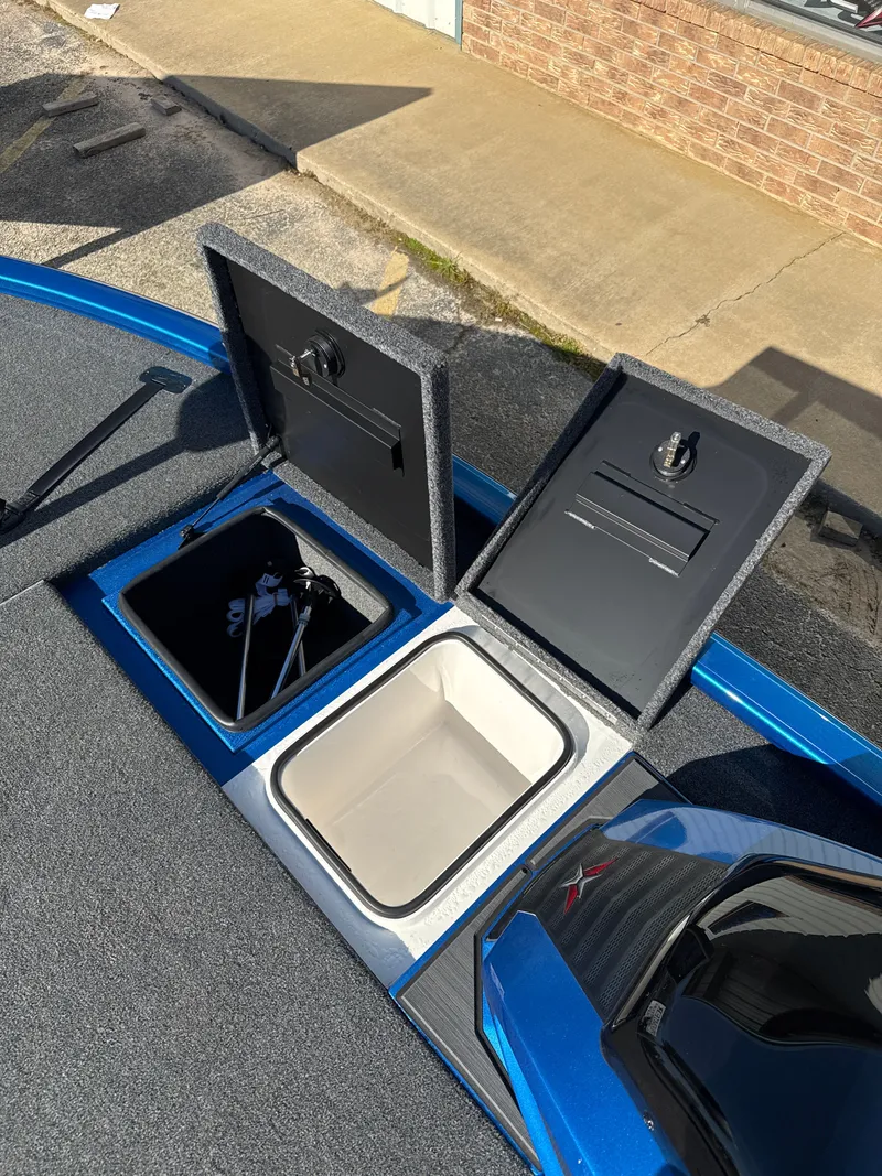 Slide: The Image of Vexus AVX1880 2025 boat with open storage compartments. - 24