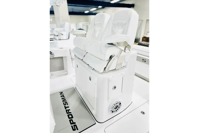 Slide: The Image of 2026 Sportsman Open 262 Center Console boat interior with white seating and sleek design. - 3
