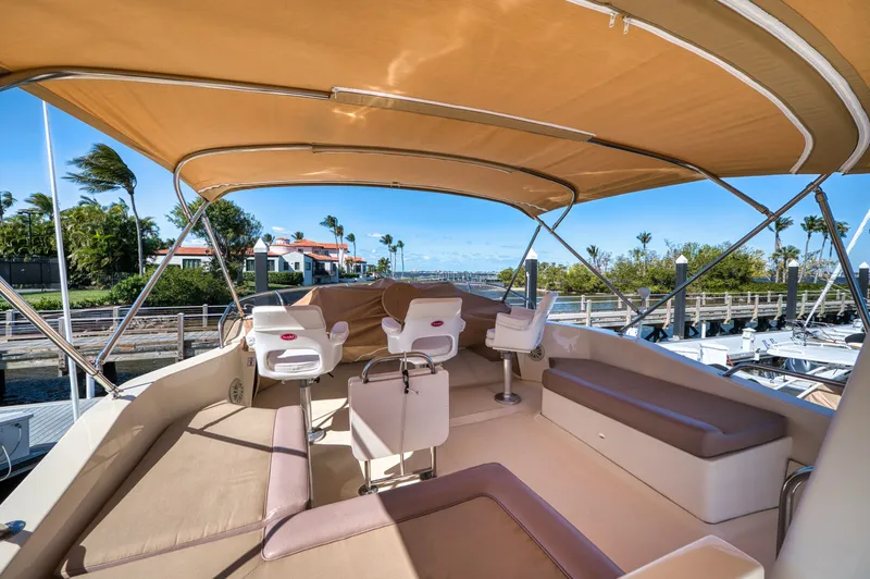 Slide: The Image of Interior view of 2006 Mainship 34 Trawler with seating area. - 10