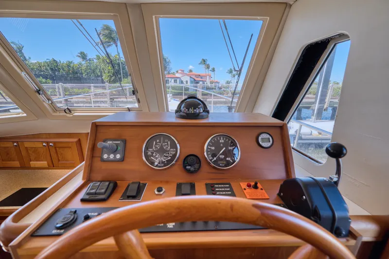 Slide: The Image of Mainship 34 Trawler 2006 helm with instruments. - 30