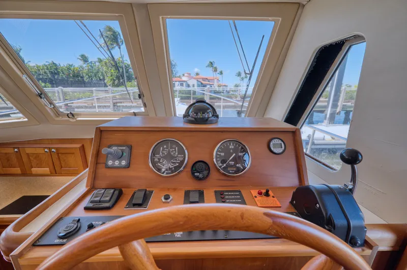 Slide: The Image of Helm of a 2006 Mainship 34 Trawler with instruments. - 31