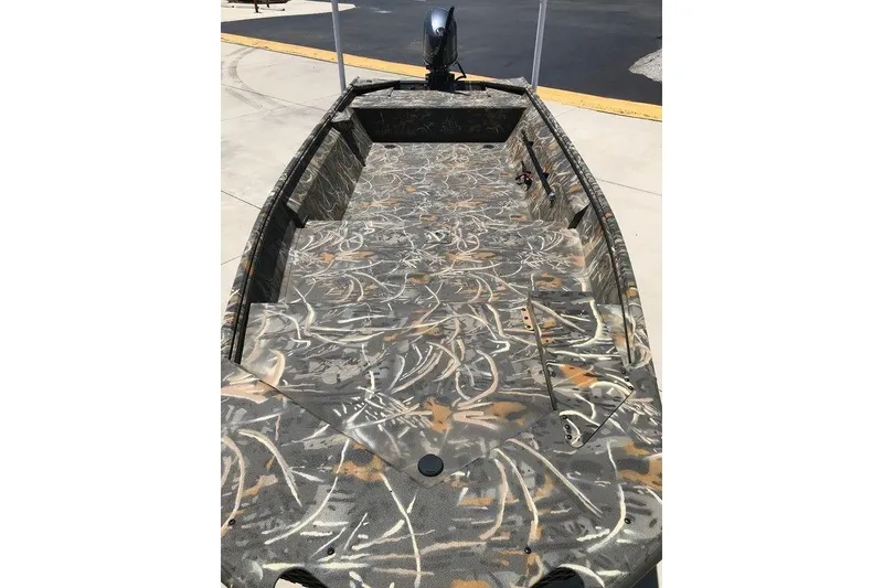 Slide: The Image of 2026 War Eagle 754LDV boat with camouflage interior design. - 5