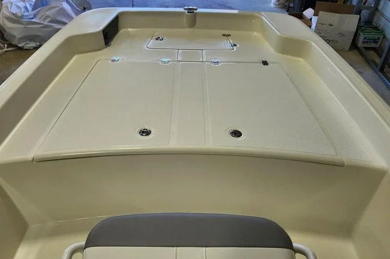 Slide: The Image of 2026 Mako Pro Skiff 17 CC boat deck, spacious and well-equipped for fishing. - 5